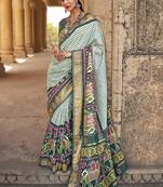   dark green printed silk saree with blouse
