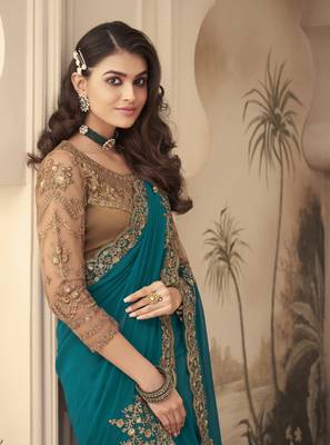 Teal embroidered  georgette saree with blouse 2