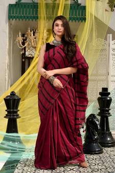 This is  Magenta Cotton handwoven saree with stripes  from Charukriti