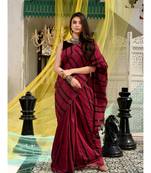 This is  Magenta Cotton handwoven saree with stripes  from Charukriti