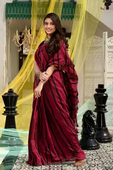 This is  Magenta Cotton handwoven saree with stripes  from Charukriti