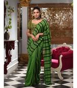 This is  Green Cotton handwoven saree with stripes  from Charukriti