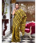 This is  Mustard Cotton handwoven saree with stripes  from Charukriti