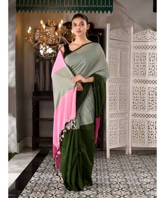 This is  Grey  Cotton handwoven saree with pompom  from Charukriti 1