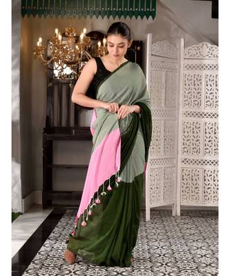 This is  Grey  Cotton handwoven saree with pompom  from Charukriti 2
