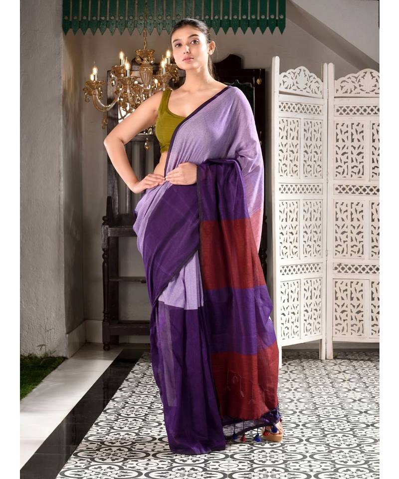 This is  Multicolor Cotton handwoven saree with pompom  from Charukriti