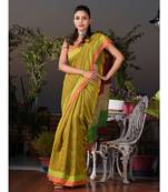 This is  Mustard Cotton handwoven saree with gicha in pallu  from Charukriti