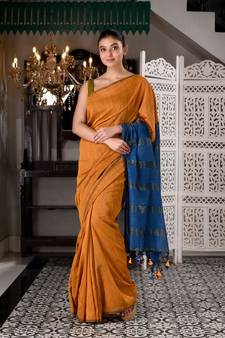 This is  Mustard Cotton  handwoven saree with zari in pallu  from Charukriti