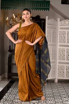 This is  Mustard Cotton  handwoven saree with zari in pallu  from Charukriti