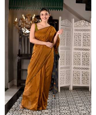 This is  Mustard Cotton  handwoven saree with zari in pallu  from Charukriti 2