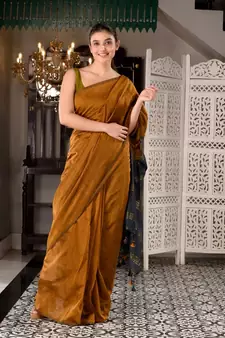 This is  Mustard Cotton  handwoven saree with zari in pallu  from Charukriti