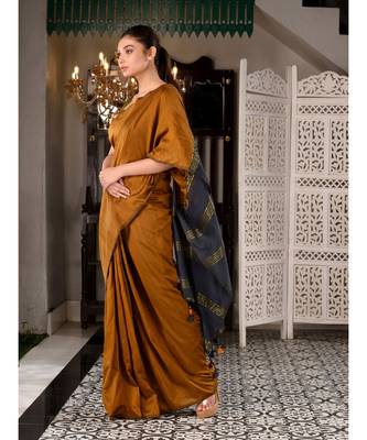 This is  Mustard Cotton  handwoven saree with zari in pallu  from Charukriti 3