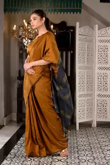 This is  Mustard Cotton  handwoven saree with zari in pallu  from Charukriti