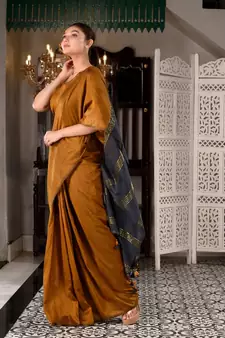 This is  Mustard Cotton  handwoven saree with zari in pallu  from Charukriti
