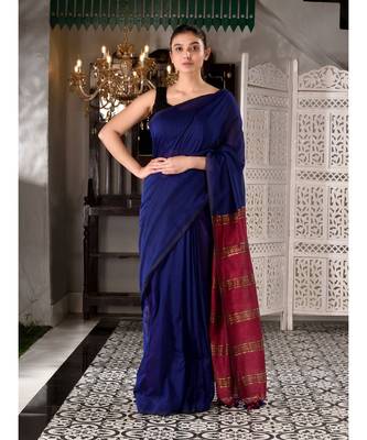 This is  Blue Cotton  handwoven saree with zari in pallu  from Charukriti 1
