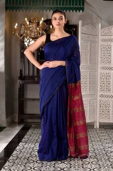 This is  Blue Cotton  handwoven saree with zari in pallu  from Charukriti