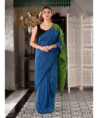 This is  Blue Cotton  handwoven saree with zari in pallu  from Charukriti 1