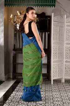 This is  Blue Cotton  handwoven saree with zari in pallu  from Charukriti