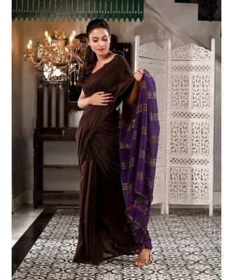 This is  Brown Cotton  handwoven saree with zari in pallu  from Charukriti 2