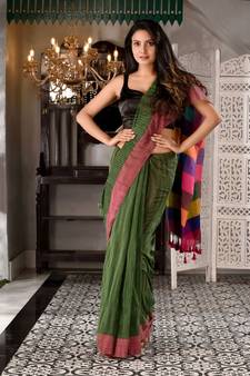This is  Moss Green Cotton textured handwoven saree with Multicolor pallu from Charukriti