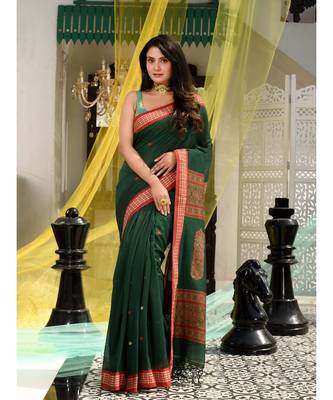 This is  Green Blended Cotton handwoven saree with floral deseign in pallu from Charukriti 1