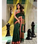 This is  Green Blended Cotton handwoven saree with floral deseign in pallu from Charukriti