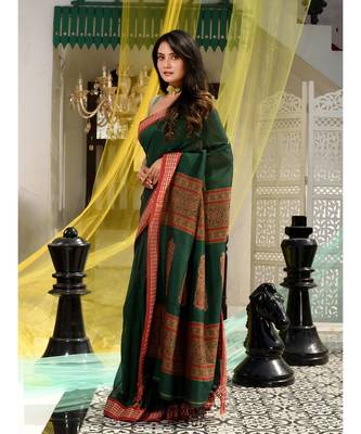 This is  Green Blended Cotton handwoven saree with floral deseign in pallu from Charukriti 2