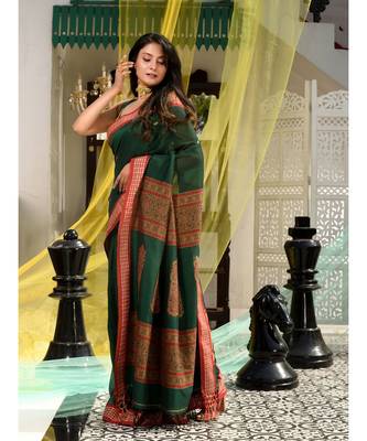 This is  Green Blended Cotton handwoven saree with floral deseign in pallu from Charukriti 3