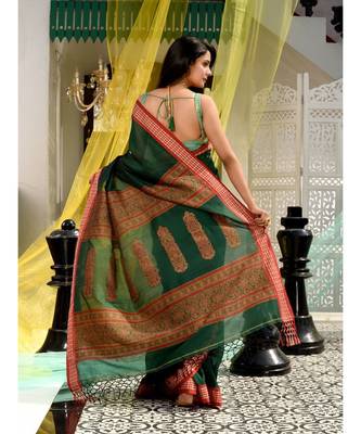This is  Green Blended Cotton handwoven saree with floral deseign in pallu from Charukriti 4