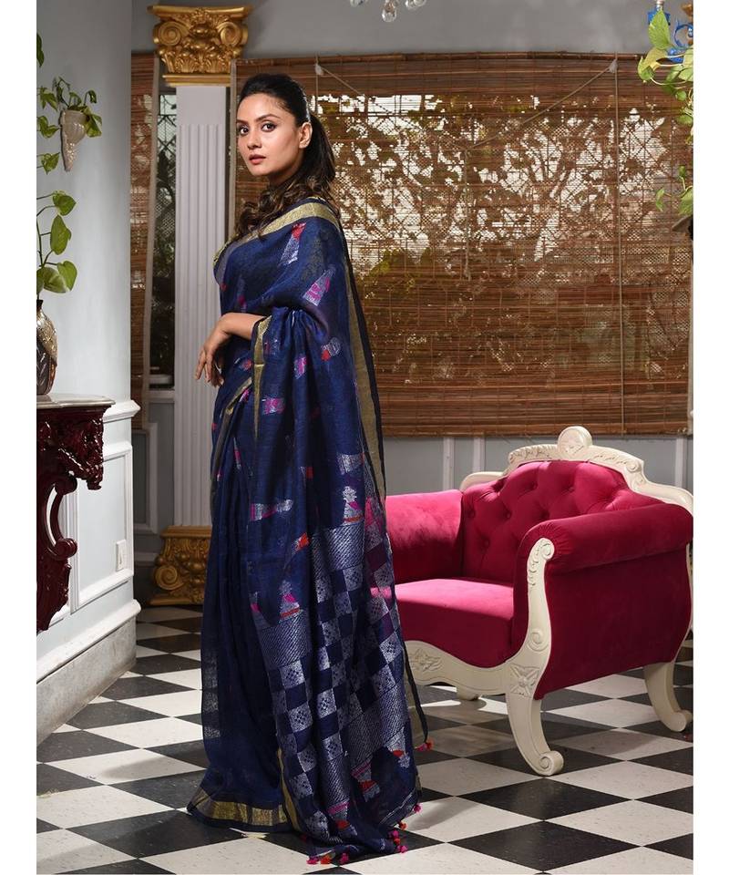 This is  Navy Blue Linen handwoven saree with geomatric design in pallu from Charukriti