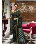 This is  Bottole Green Linen handwoven saree with geomatric design in pallu from Charukriti