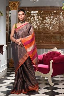 This is  Grey Tissue handwoven saree  from Charukriti
