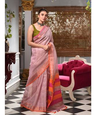 This is  Mauve Tissue handwoven saree  from Charukriti 1