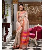 This is  Light Pink Tissue handwoven saree  from Charukriti