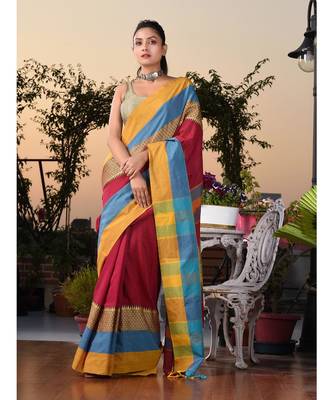 This is  Magenta Blended Cotton handwoven saree with temple design from Charukriti 1