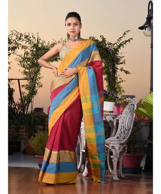 This is  Magenta Blended Cotton handwoven saree with temple design from Charukriti 2