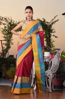 This is  Magenta Blended Cotton handwoven saree with temple design from Charukriti