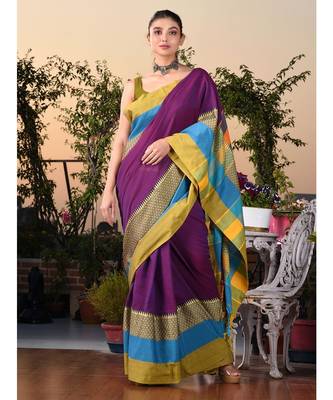 This is  Purple Blended Cotton handwoven saree with temple design from Charukriti 1