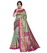 Green printed art silk saree with blouse
