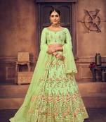Light Green Embroidered Net Semi Stitched Lehenga Choli With Dupatta