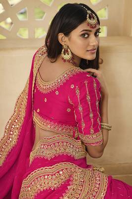   rani pink embroidered georgette saree with blouse 3