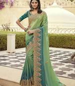   sea green embroidered viscose saree with blouse