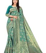 Turquoise Woven Silk Blend Saree With Blouse