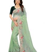 Sea green embroidered organza saree with blouse