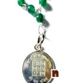 green beaded necklace with spritual pendant