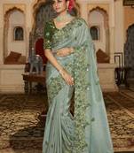   sea green embroidered viscose saree with blouse