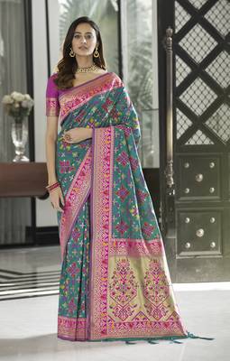 Green woven silk saree with blouse 1