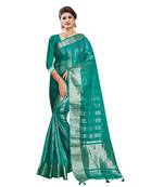 Teal woven organza saree with blouse