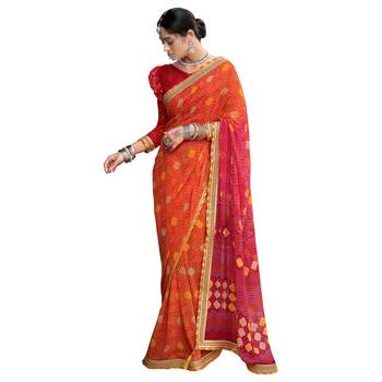 Orange printed pure georgette saree with blouse 1