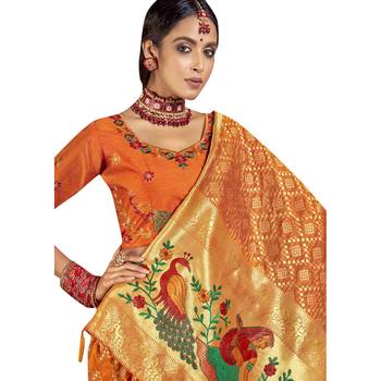 Orange woven silk blend saree with blouse 2